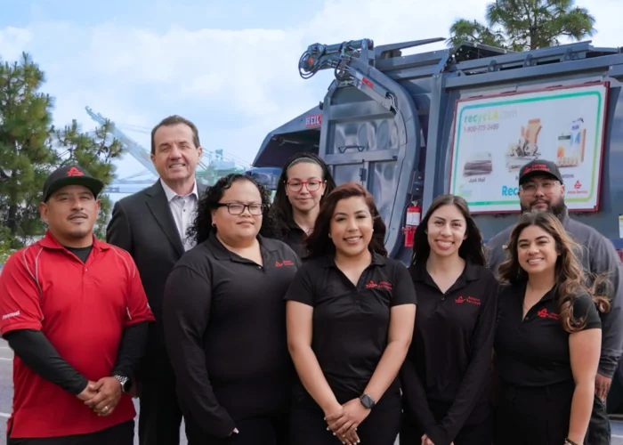 Thumbnail of Athens Services Team Members Standing Infront Of Front Loader Trash Truck In San Pedro