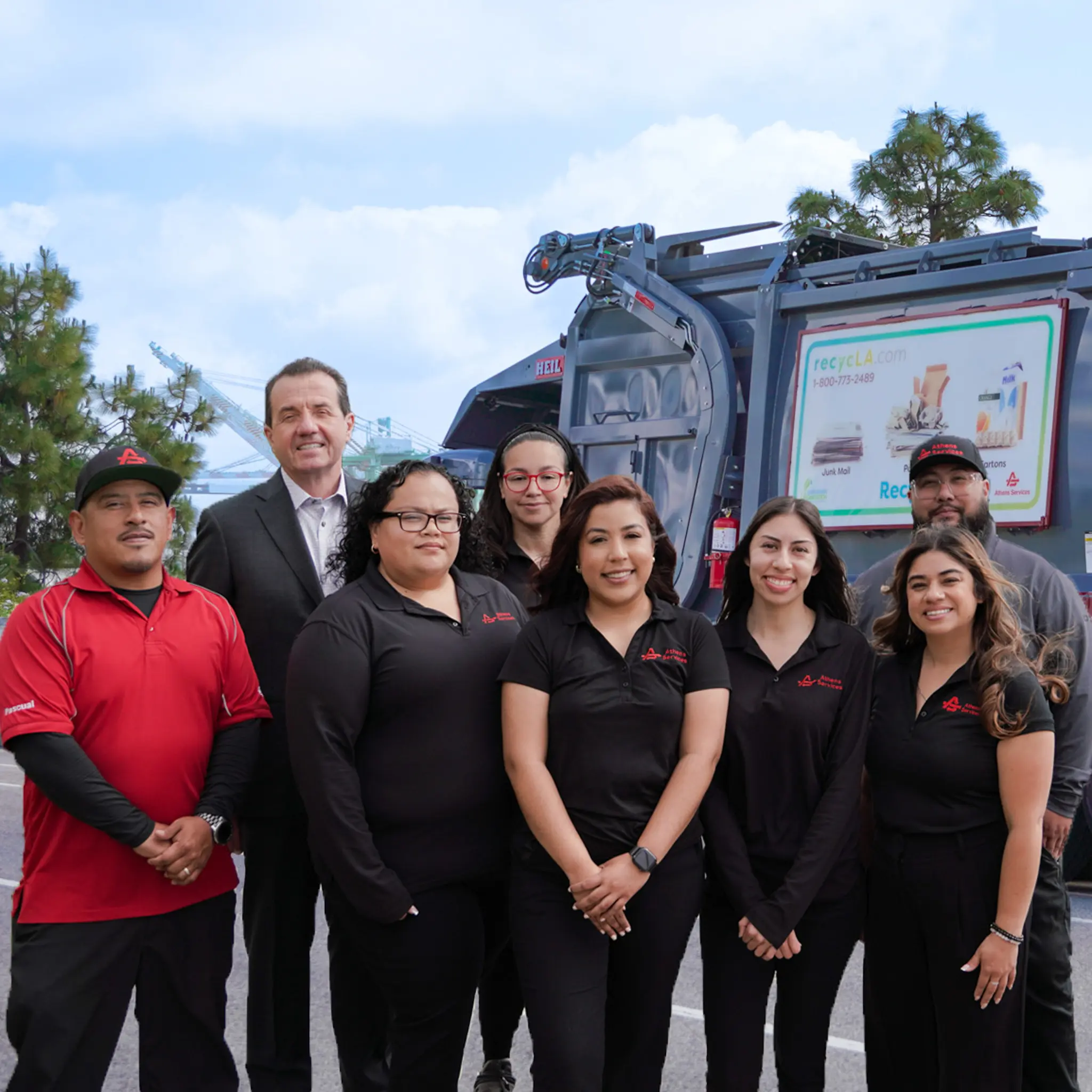 Thumbnail of Athens Services Team Members Standing Infront Of Front Loader Trash Truck In San Pedro